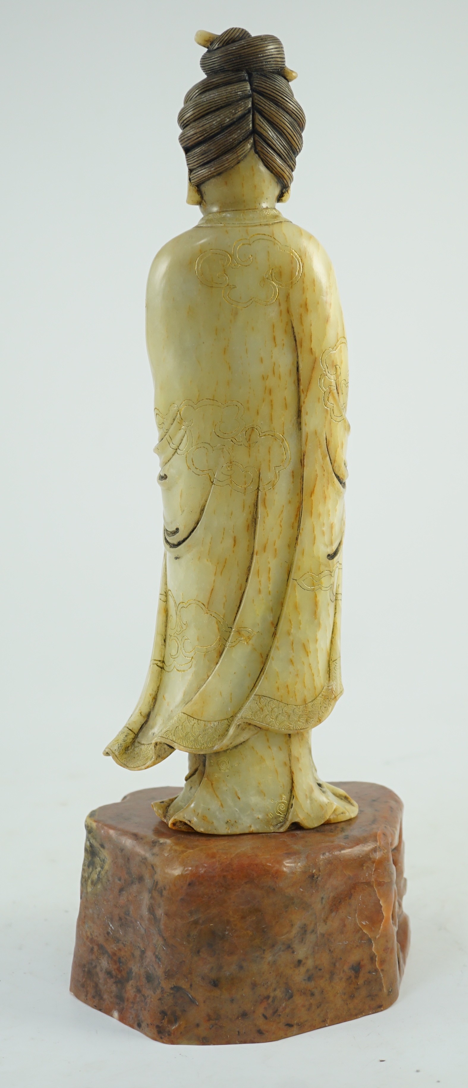 A Chinese soapstone standing figure of Guanyin, 19th century, 38cm high